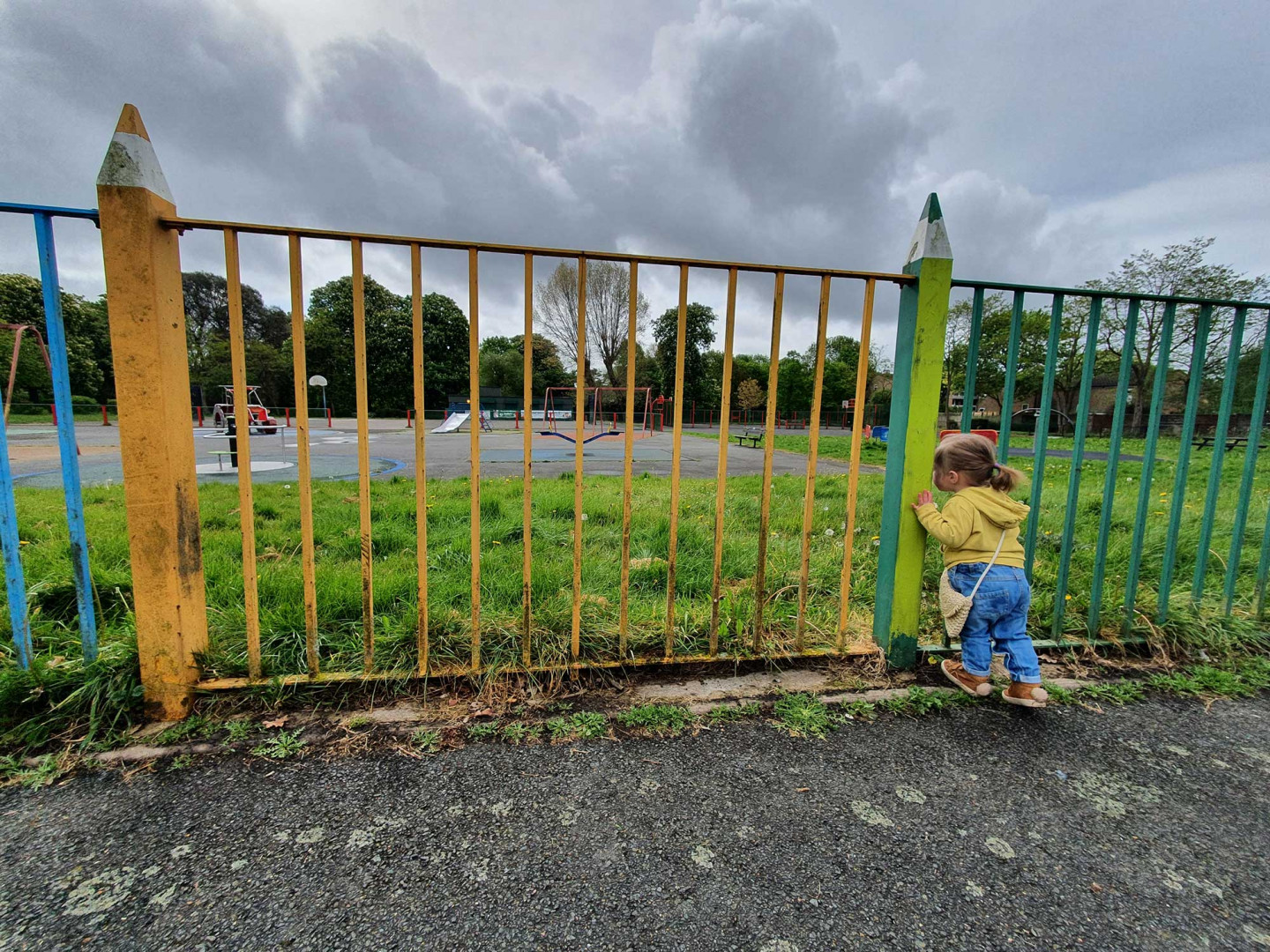 Lucy looking longingly through the fence at our locked up local park, Betts Park, Penge, 30 April 2020 © Michael James