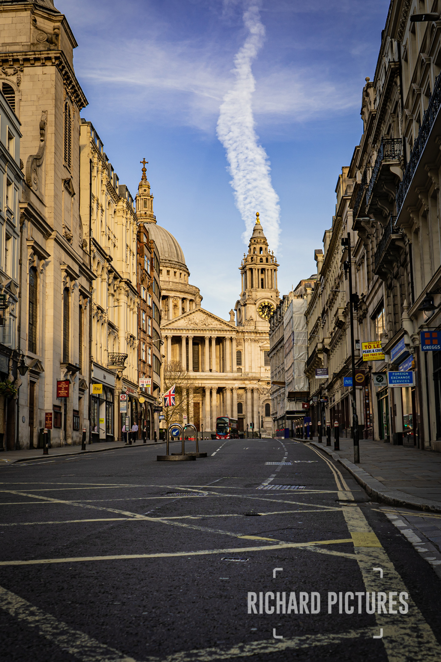 I took this photo on Friday 11th April on my way into work. The weather was incredible and the light was perfect. The streets were nearly empty, but I have never seen so many cyclists on London roads.
 © Richard Lawrence